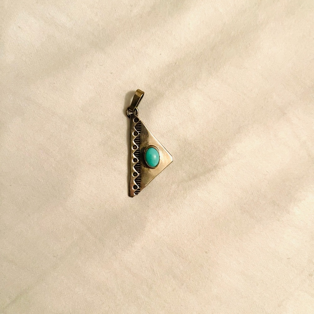 Turquoise and silver pendant